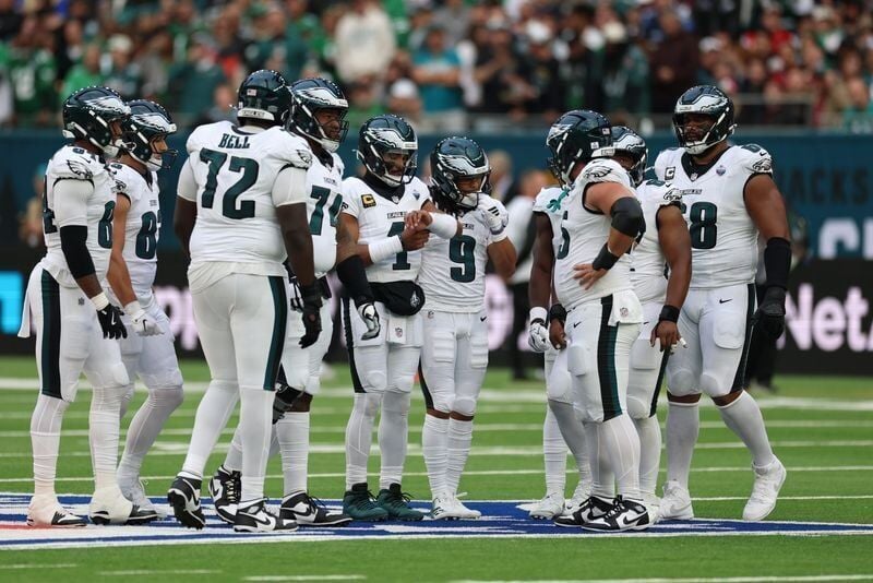 Oct 11, 2026; Tottenham, ENG;  Philadelphia Eagles quarterback Jalen Hurts (1) huddles with hsi offense during the second half against the Jacksonville Jaguars at Tottenham Hotspur Stadium.  Mandatory Credit: Nathan Ray Seebeck-Imagn Images