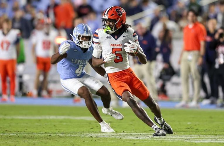Oct 24, 2026; Chapel Hill, North Carolina, USA;  Syracuse Orange wide receiver Calvin Russell III (5) runs with the ball during the fourth quarter against North Carolina Tar Heels at Kenan Stadium.  Mandatory Credit: Cory Knowlton-Imagn Images