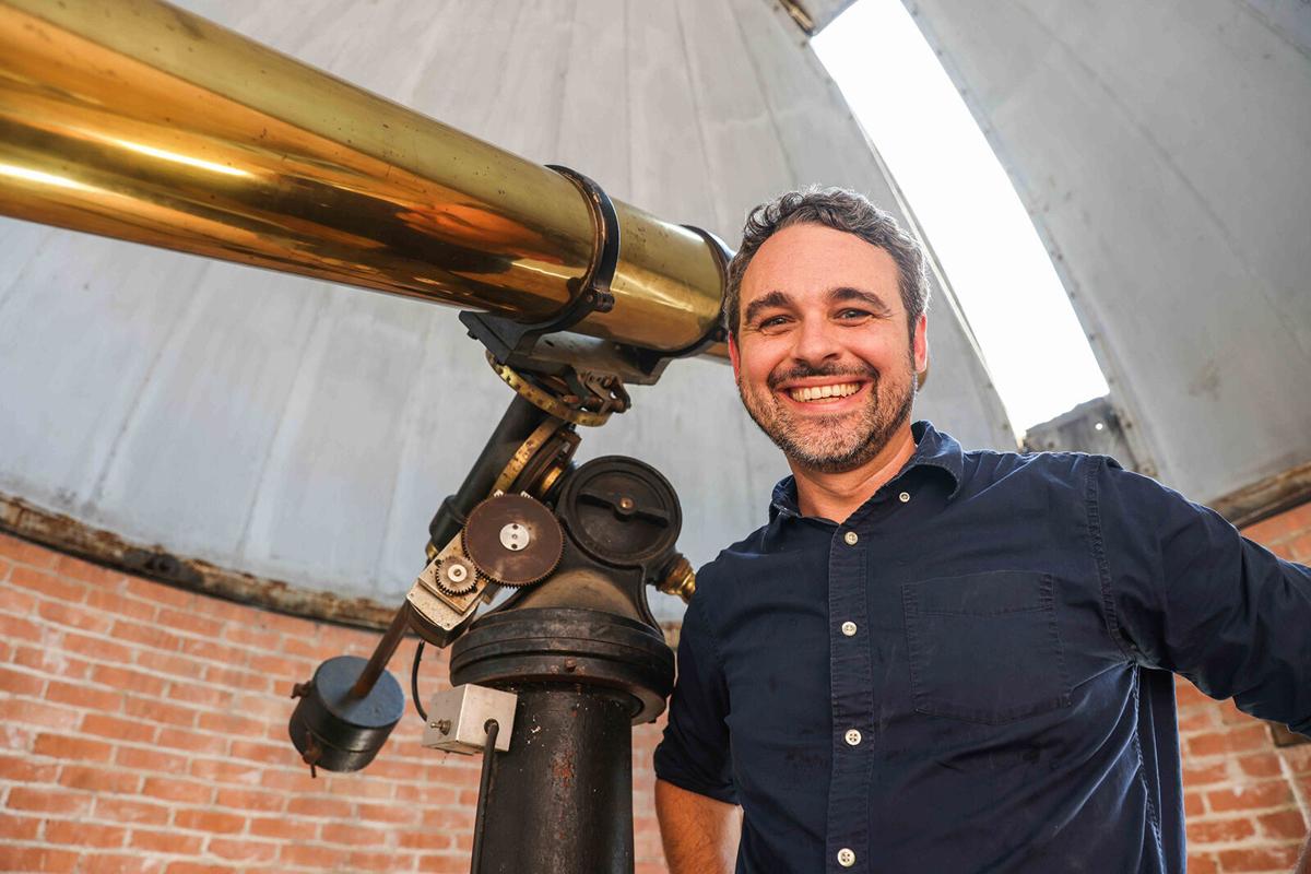 Matt Siegler, a professor at SMU, poses at an old observatory near Heroy Hall in Dallas on Thursday, July 29, 2021.
