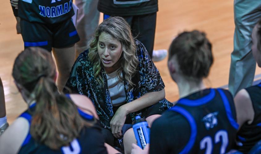 Lake Norman outscored Hickory Ridge 14-2 over the last four minutes to win 61-47.