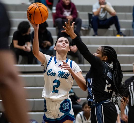 Hickory Ridge beat Cox Mill, 58 - 36