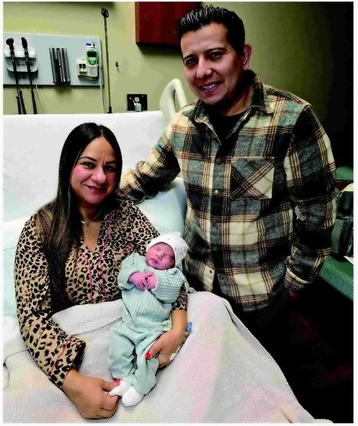 NEW YEAR'S BABY MAKES ENTRANCE