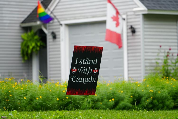 As seen on July 16, 2026, a yard sign on a home sitting on the U.S.-Canada border in northern Vermont alludes to the tensions between the two countries inflamed by why many Canadians see as President Donald Trump’s unfair criticisms of the country, its t