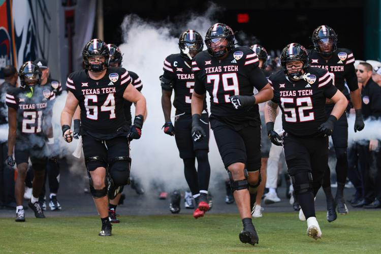Jan 1, 2026; Miami Gardens, FL, USA; The Texas Tech Red Raiders take the field prior to the 2025 Orange Bowl and quarterfinal game of the College Football Playoff against the Oregon Ducks at Hard Rock Stadium. Mandatory Credit: Sam Navarro-Imagn Images
