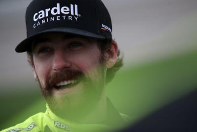 Driver Ryan Blaney waits on the grid prior to the NASCAR Cup Series Hollywood Casino 400 at Kansas Speedway on Oct. 24, 2021, in Kansas City, Kansas.