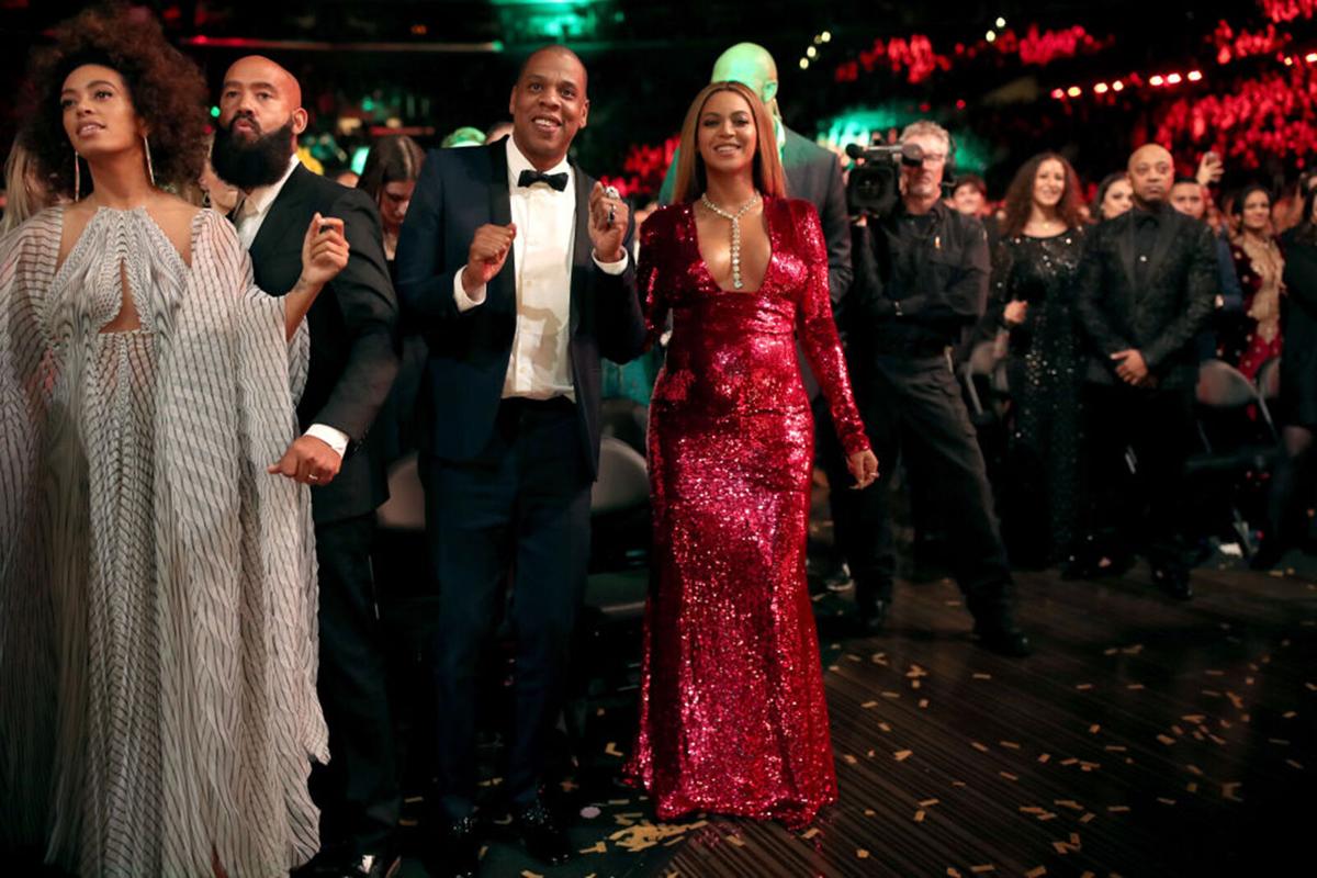 From left, singer Solange Knowles, Alan Ferguson, hip-hop artist Jay-Z and singer Beyonce during The 59th Grammy Awards at Staples Center on Feb. 12, 2017, in Los Angeles.