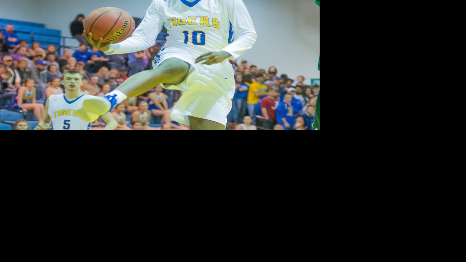 Boys Basketball Moore Kick Starts Tigers Blowout Performance In