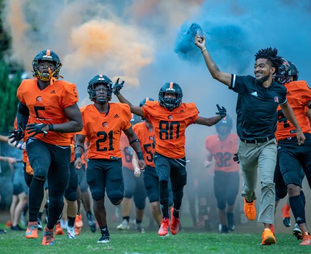 The Chargers defeated the Trojans 45-6 to win the Coddle Creek trophy.