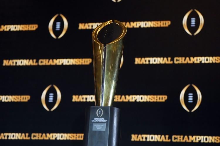 Jan 10, 2023; Los Angeles, CA, USA; The College Football Playoff National Championship trophy at CFP Champions press conference at Los Angeles Airport Marriott. Mandatory Credit: Kirby Lee-USA TODAY Sports