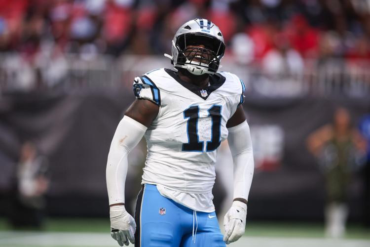 Nov 16, 2025; Atlanta, Georgia, USA; Carolina Panthers outside linebacker Nic Scourton (11) reacts after a play in the fourth quarter against the Atlanta Falcons at Mercedes-Benz Stadium. Mandatory Credit: Brett Davis-Imagn Images