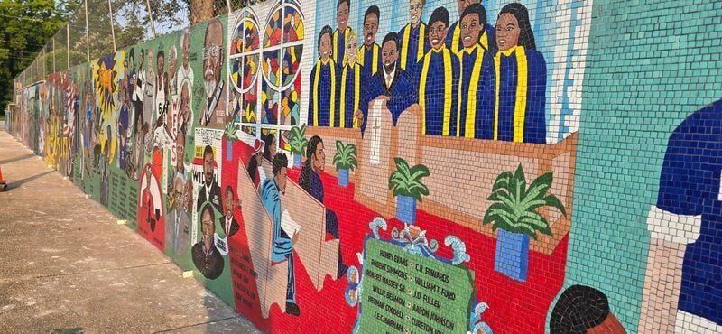 The Wall of Honor on Murchison Road and Langdon Street has been redone in mosaic tile, a joint project of the city of Fayetteville and the Umoja Group. The mural honors Black history and generations of leaders in the area of E.E. Smith High School and F...
