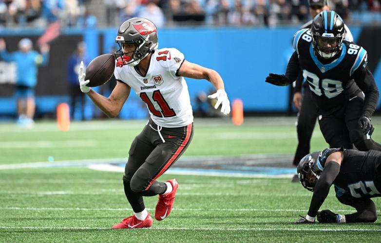 Tampa Bay Buccaneers wide receiver Jalen McMillan (11) makes a catch during the first half against the Carolina Panthers at Bank of America Stadium.