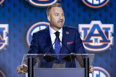 Auburn head coach Alex Golesh speaks at SEC Football Media Day at Tampa Marriott Water Street on Tuesday, July 21, 2026, in Tampa, Florida.