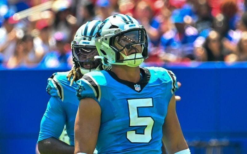Aug 15, 2026; Orchard Park, New York, USA; Carolina Panthers linebacker Jaelan Phillips (5) watches a replay in the first quarter against the Buffalo Bills at the New Highmark Stadium. Mandatory Credit: Mark Konezny-Imagn Images