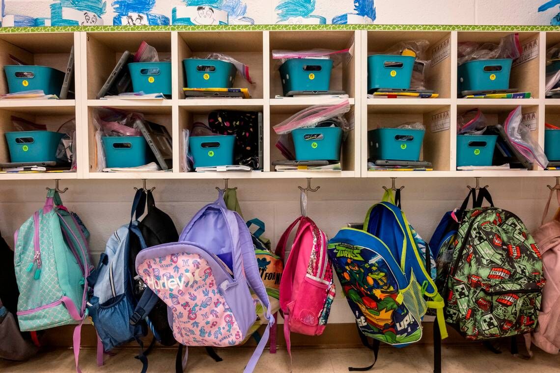 Coastal Carolina University athletes read to a kindergarten classes at Palmetto Bays Elementary School. Eighty-six Coastal Carolina athletes visited 86 local kindergarten classrooms to read the book Couch Potato by Jory John on Wednesday as part of Th...