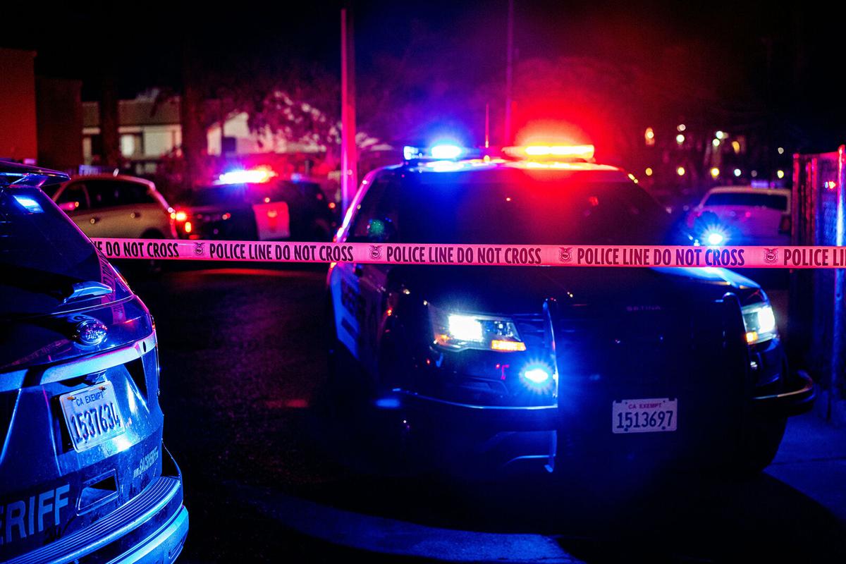 Police tape blocks off the crime scene outside a church where a man shot dead four people, including three of his children, before turning the gun on himself, Feb. 28, 2022, in Sacramento, California.