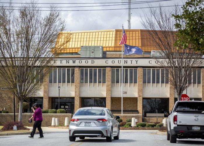 UNCOVERED A Greenwood judge auctioned foreclosed properties. His wife