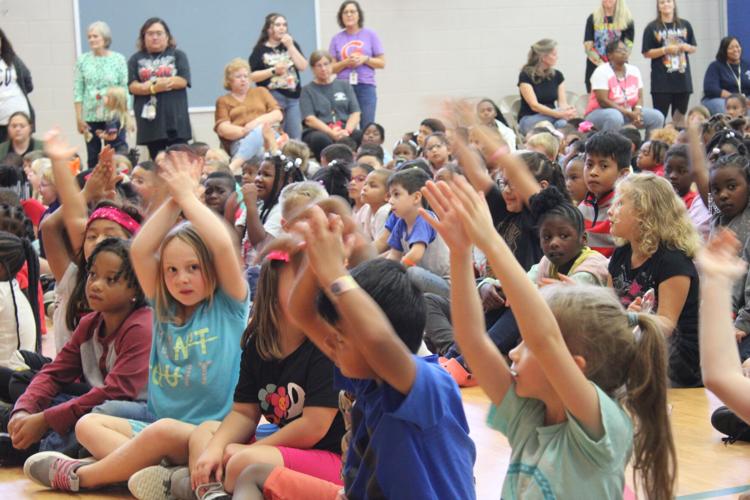 Mathews Elementary students rock and roll before intersession News