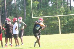 Burton sets the standard as McCormick opens fall camp