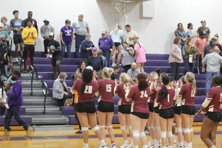 Six defeats Saluda, clinches region title Sports