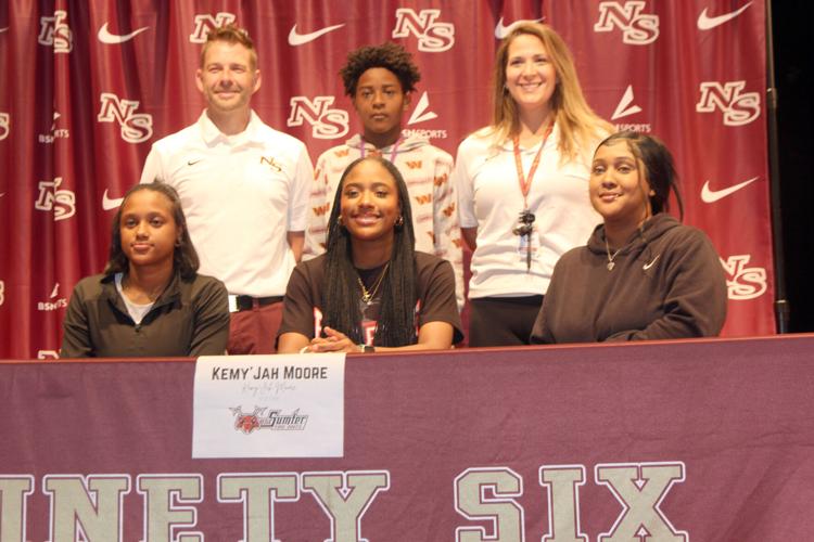 Kemy'Jah with family and coaches