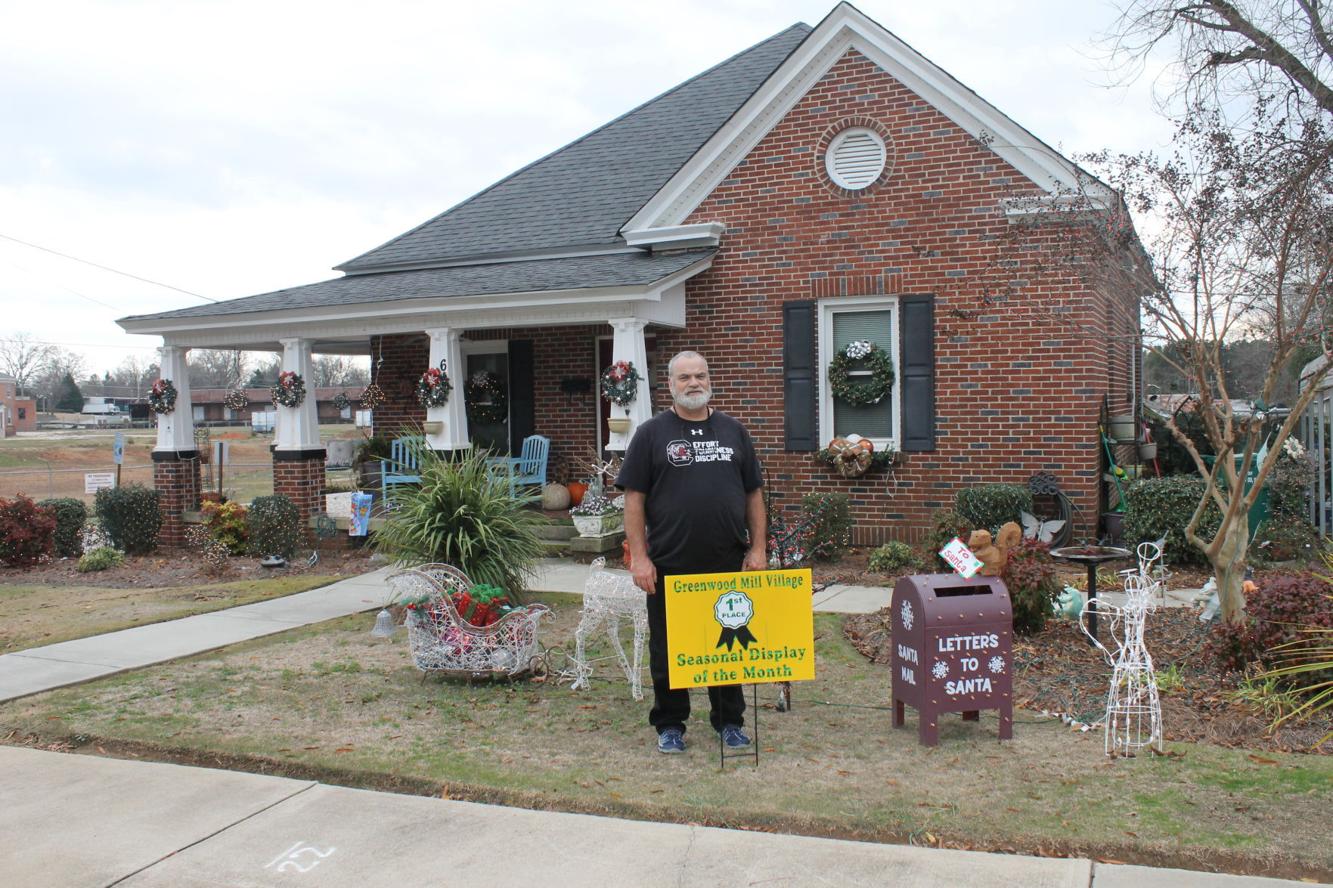 Greenwood Mill Village awards Yard of the Month Lakelands Connector