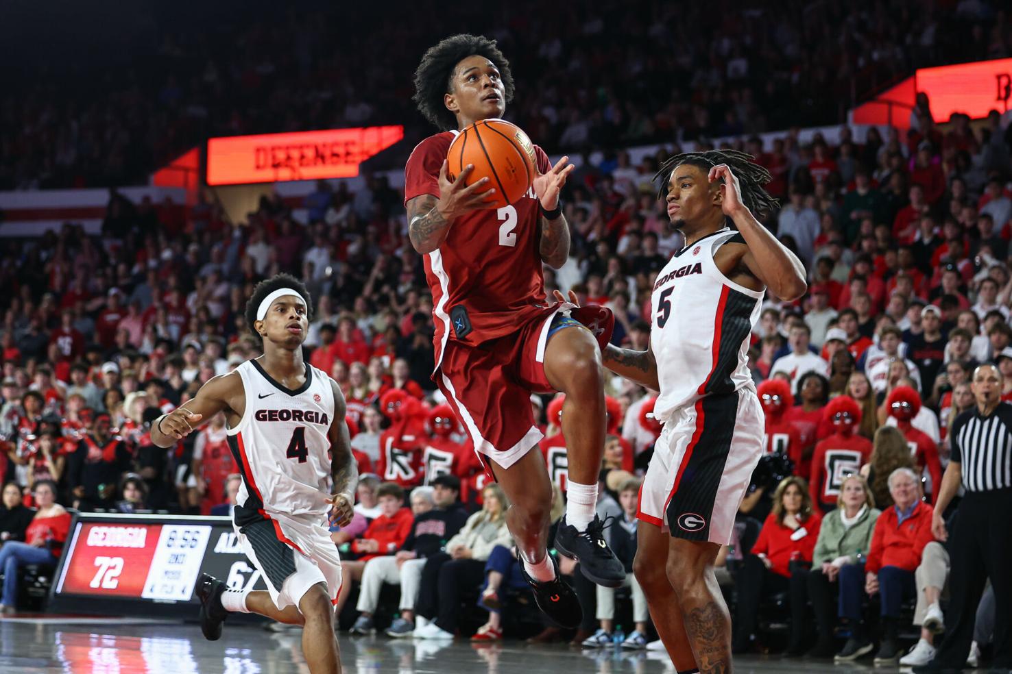 Aden Holloway, Alabama's No. 2 scorer, had 2.1 pounds of marijuana when ...