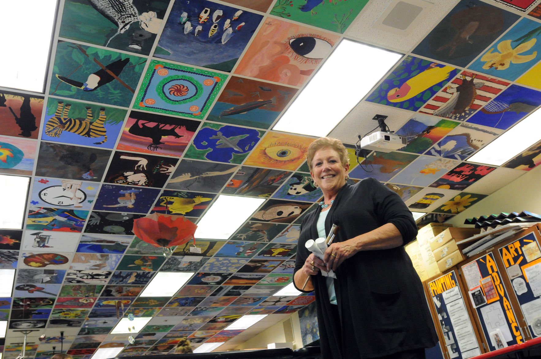 Art teacher remembers students through painted ceiling tiles