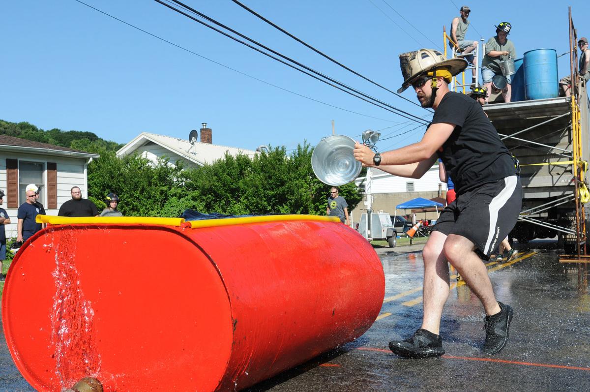 Gazette Photos Bucket brigade headlines firefighters competition