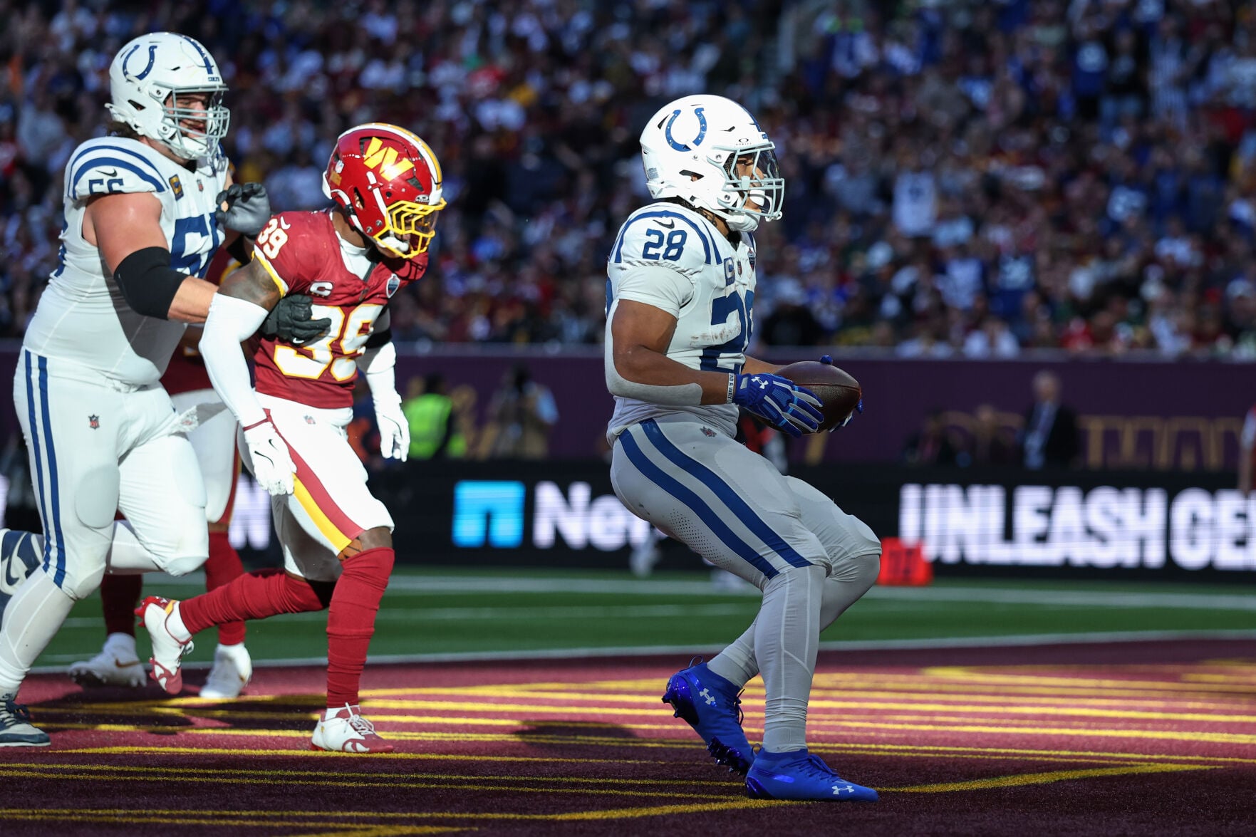 Commanders Stadium Lettering Taylor runs for 2 TDs and Colts beat Commanders 30-13 in London ...