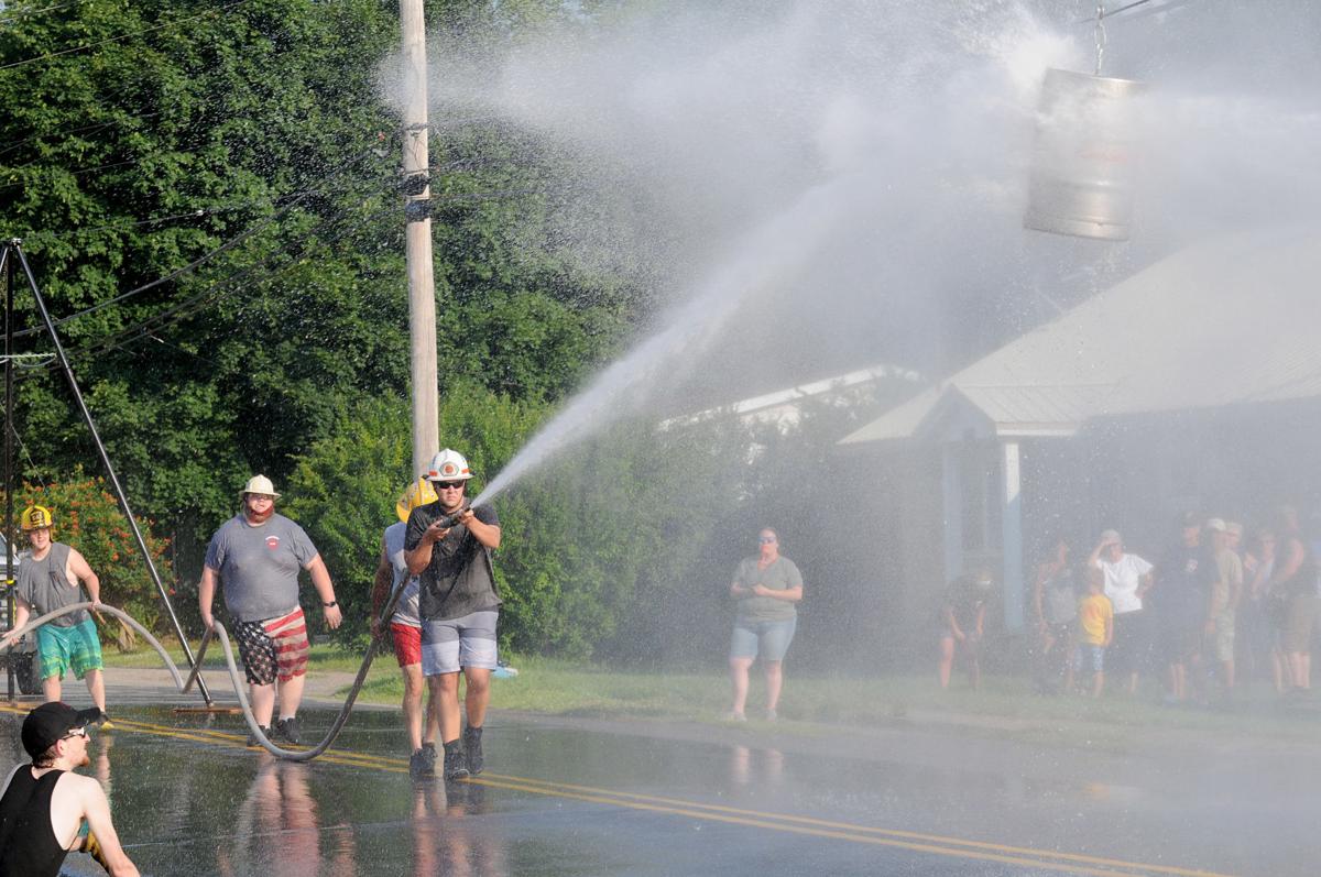 Gazette Photos Firefighters compete in battle of the barrel News