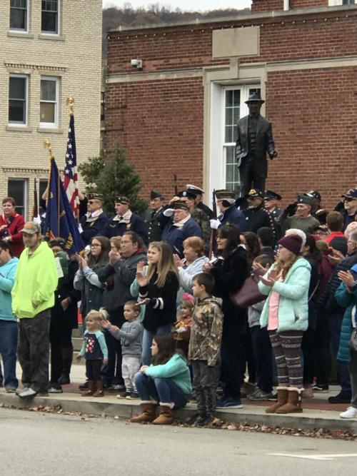 Parade watchers wait