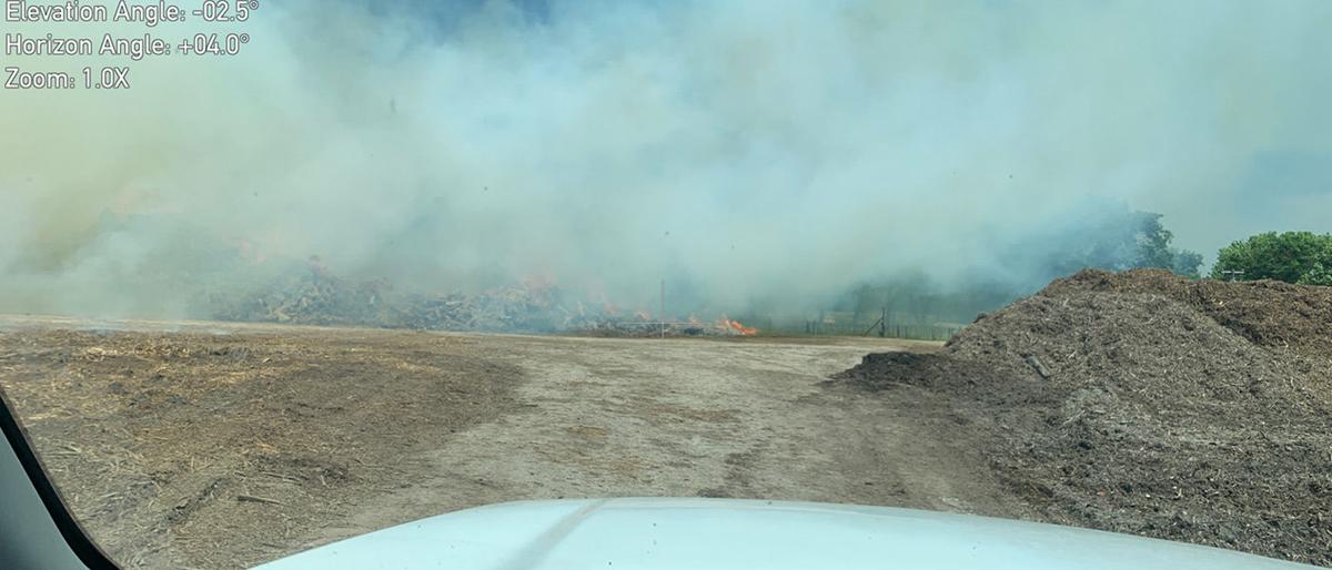 Multiple fire departments, agencies working large mulch pile fire in