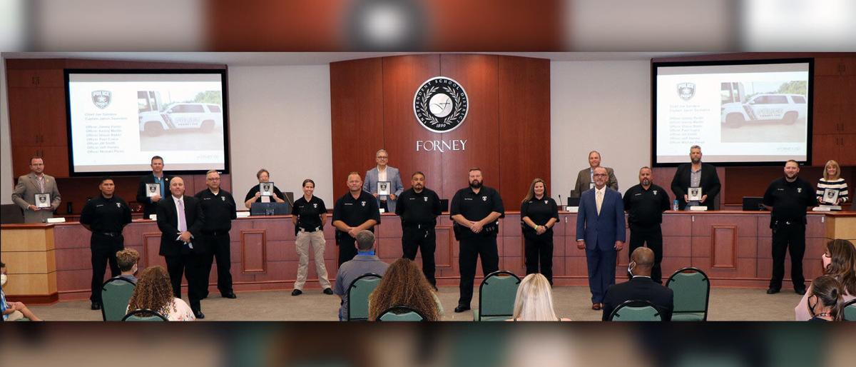 Forney ISD swears in police chief, 8 police officers for