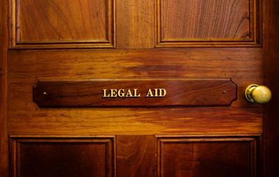 Legal aid sign on door