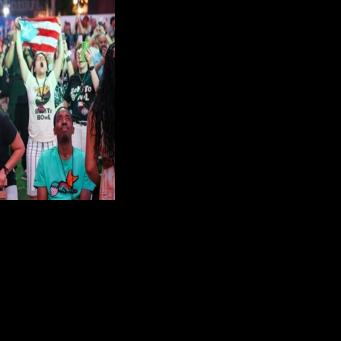 Fans react to the Bad Bunny halftime show during a Super Bowl viewing party in San Juan, Puerto Rico