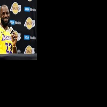 Los Angeles Lakers superstar LeBron James talks to reporters at media day before the NBA season
