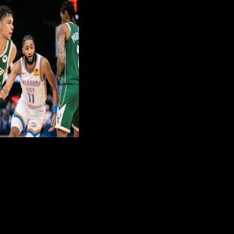 Milwaukee's Ousmane Dieng drives to the basket past Isaiah Joe in the Bucks' NBA win over the Oklahoma City Thunder