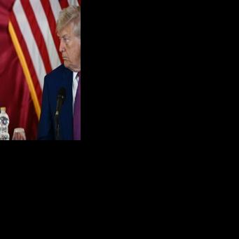 Boeing CEO Kelly Ortberg (L), seen with President Donald Trump during a May 2025 visit to Qatar, says the company's certification efforts remain on track