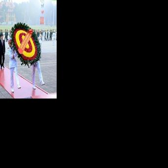 A handout photograph released by the 14th National Congress via the Vietnam News Agency shows paying their respects at the Ho Chi Minh mausoleum in Hanoi