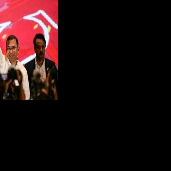 Prime minister-in-waiting Tarique Rahman (C) said his election victory 'belongs to Bangladesh, belongs to democracy'