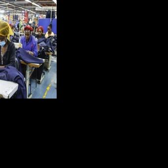 Workers make jeans at the United Aryan textile factory in Nairobi