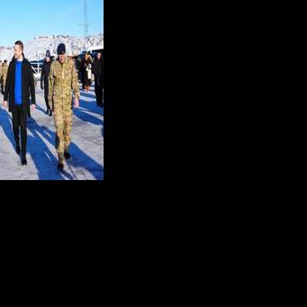 Denmark's King Frederik X and Greenland's Prime Minister Jens-Frederik Nielsen (C) visit Arctic Basic Training and Arctic Command in Nuuk, Greenland, on February 18, 2026