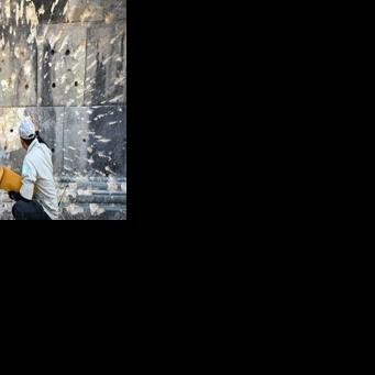 Cambodian officials say heavy artillery shelling and aerial bombardment carried out by the Thai army caused damage to the Preah Vihear temple