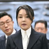 South Korea's former first lady Kim Keon Hee, wife of impeached former president Yoon Suk Yeol, arrives for a hearing at the Seoul Central District Court on August 12