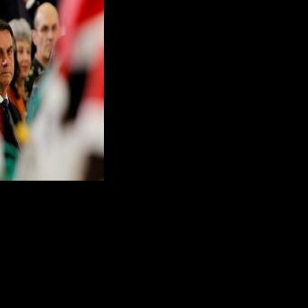 Brazil's then-president Jair Bolsonaro attends a Christmas event in Brasilia in 2019