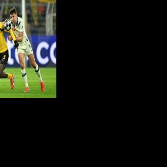 Serhou Guirassy (L) scored the opener as Borussia Dortmund beat Atalanta 2-0 in Germany