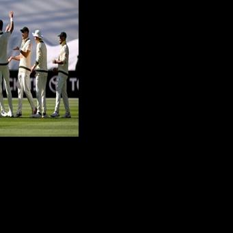 Australia's Scott Boland is congratulated after taking a catch to dismiss England's Brydon Carse