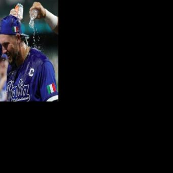 Italy captain Vinnie Pasquantino is showered with water after his team's defeat of Mexico