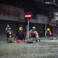 Rescue teams looked for people in need of help in Macau during Typhoon Ragasa
